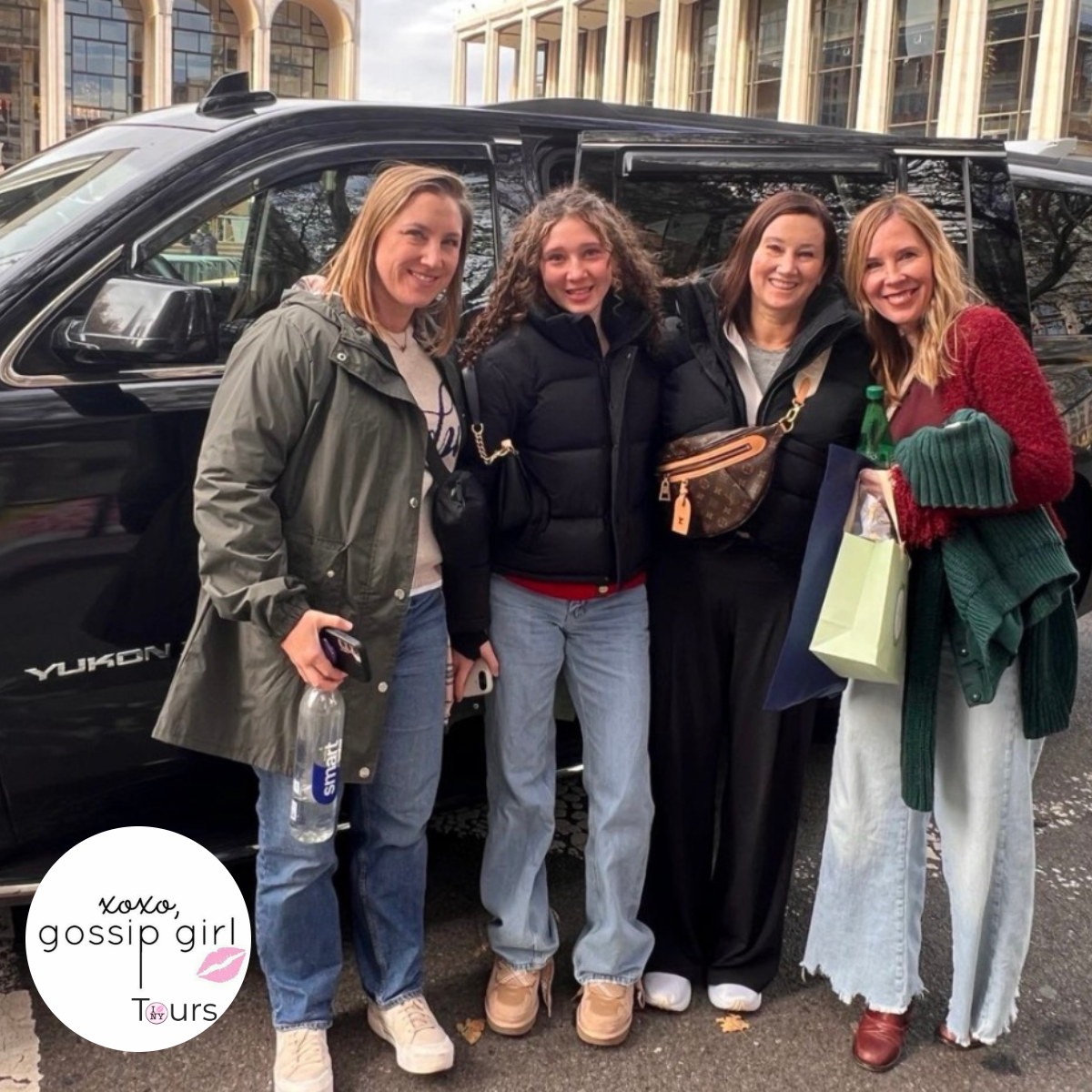 Four Gossip Girl Tours guests beside a black SUV before the Gossip Girl Bus and SUV tour in New York City